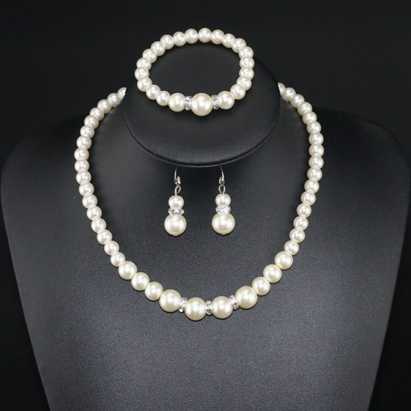 Three-piece Pearl Necklace  Bracelet  And  Earrings